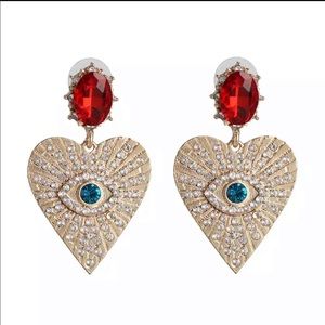 Red stone heart with mal de ojo eye earring